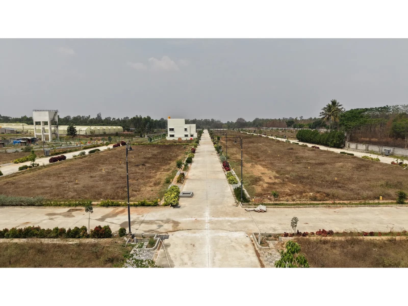 Guru Punvaanii Exotica: Site photo filed with Karnataka RERA