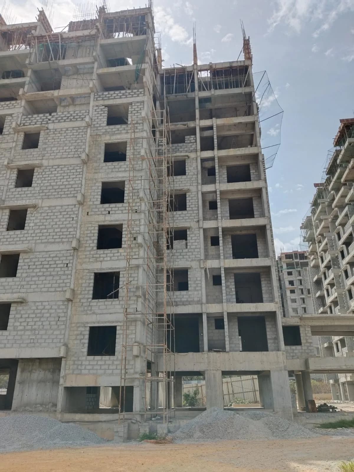 Mohan Tritone: Site photo filed with Karnataka RERA
