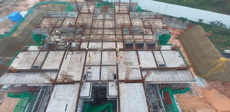 Down by the Water: Site photo filed with Karnataka RERA